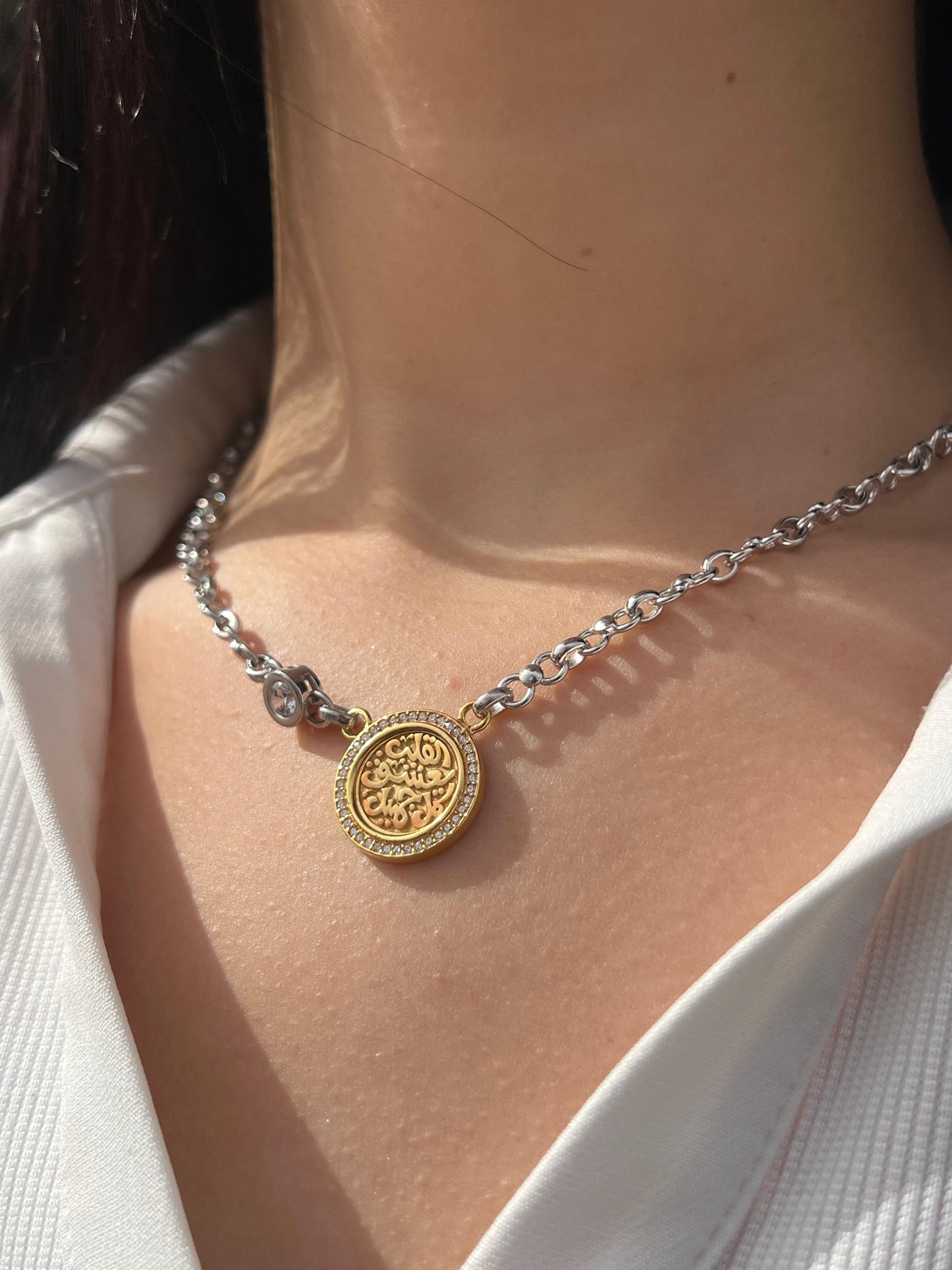 X “القلب يعشق كل جميل” Necklace — Sterling Silver with Gold Plating