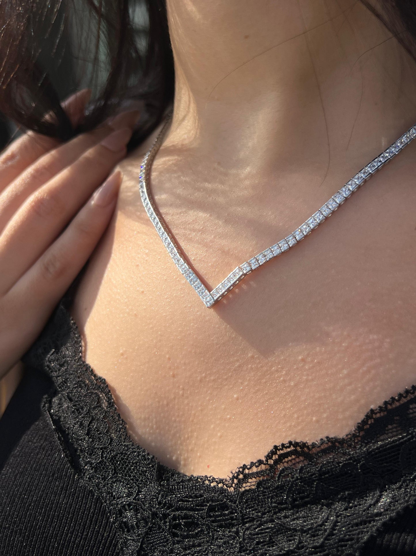 a V-neck Tennis Necklace in Sterling Silver 925s